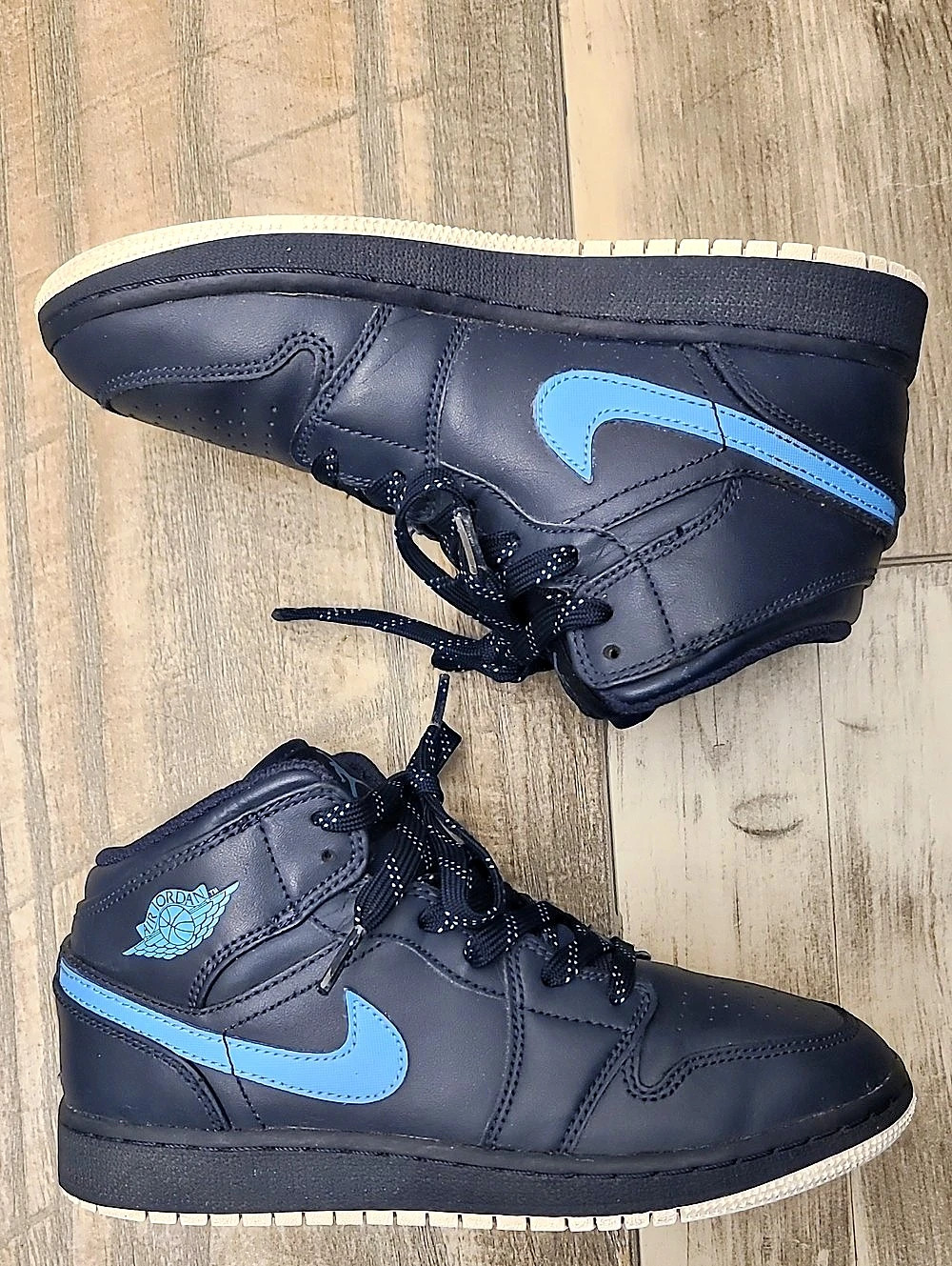 Jordan Air Jordan 1 Mid Obsidian University Blue High Top Sneakers Black & Blue